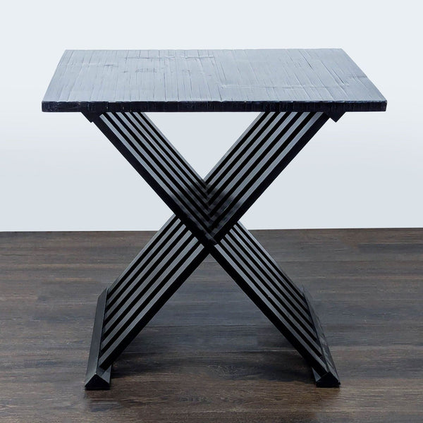 1. Black bamboo and Gmelina wood end table with a glossy finish and X-shaped slatted base by Bernhardt Furniture.