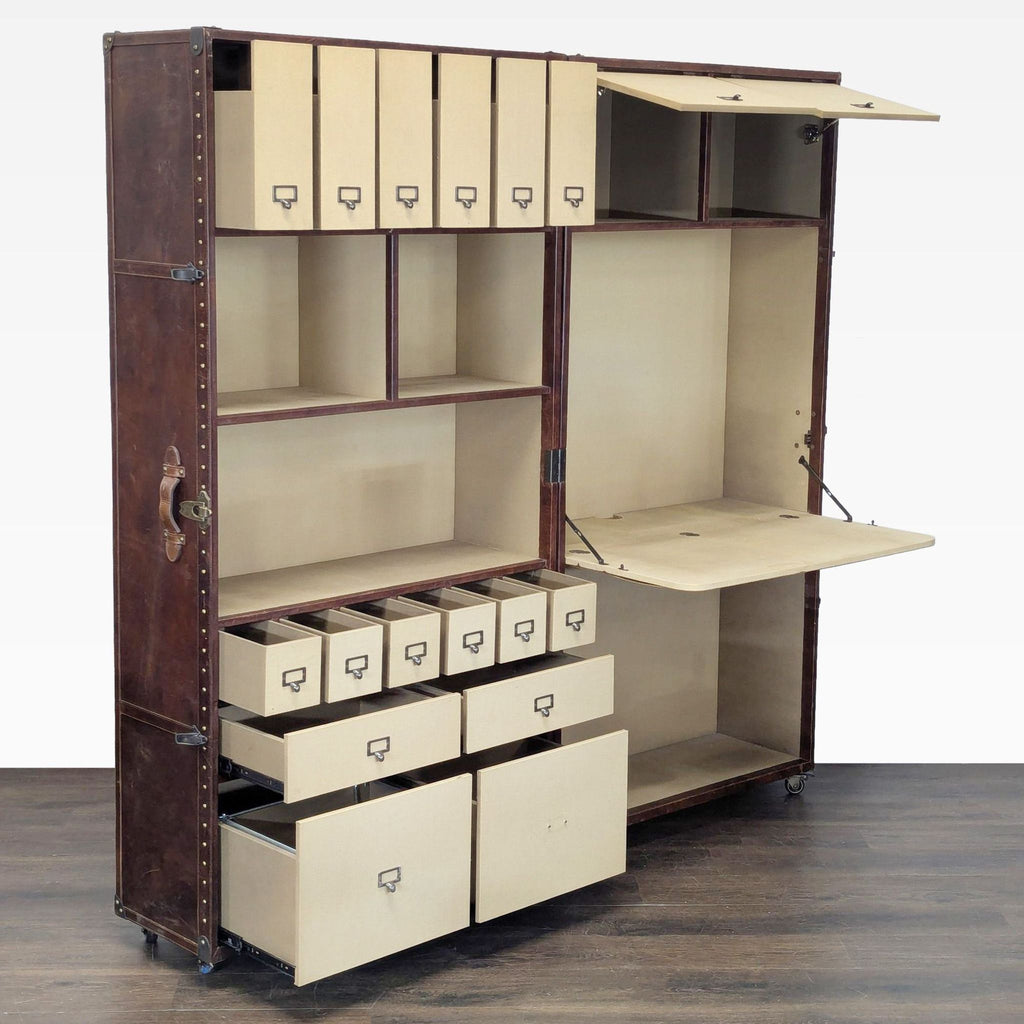 Restoration Hardware office trunk on wheels, showcasing leather finish, brass hardware, and organized interior shelving.