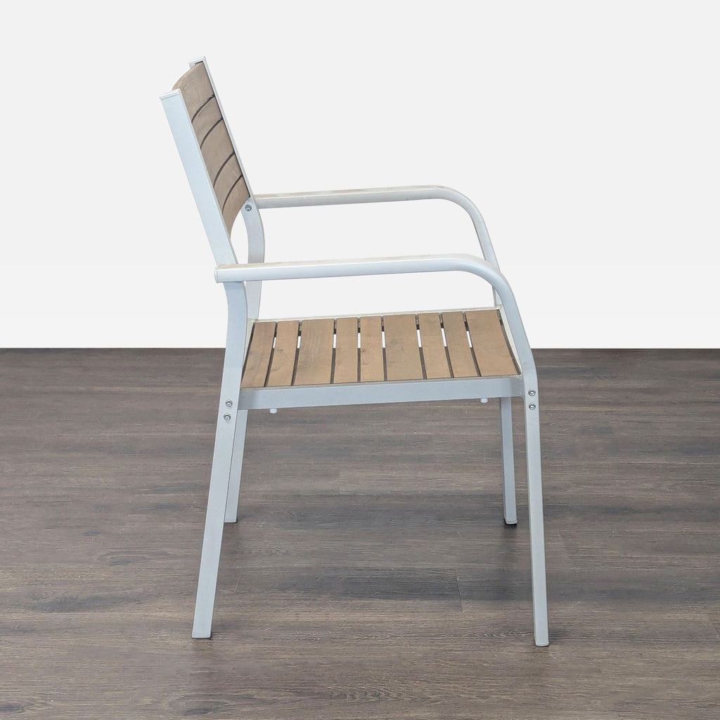 Sturdy Ikea chair with metal frame and wood slat design, comfortable armrests, ideal for patios or dining spaces.