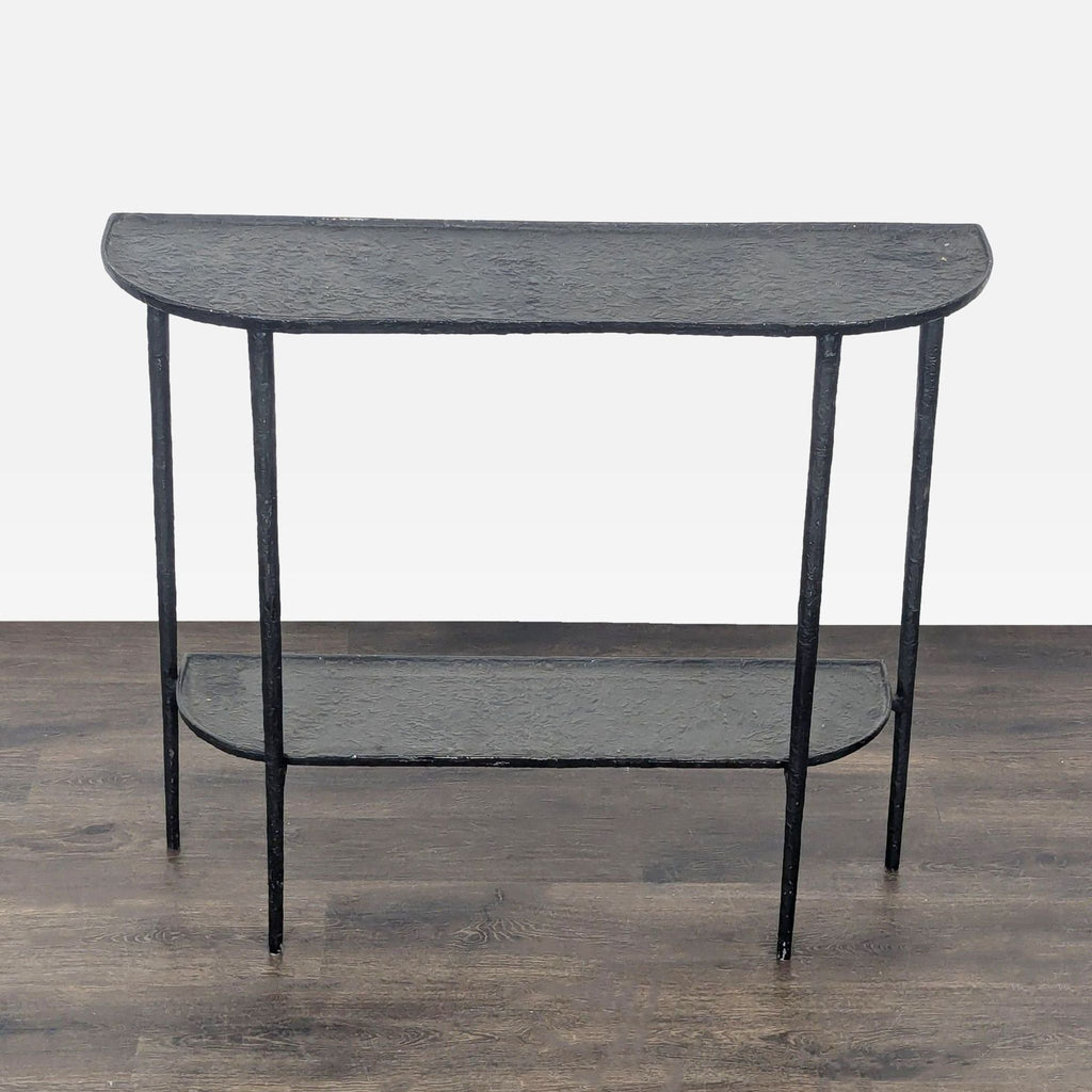 Demilune metal side table with two shelves and unique textured surface, Outlook International brand.