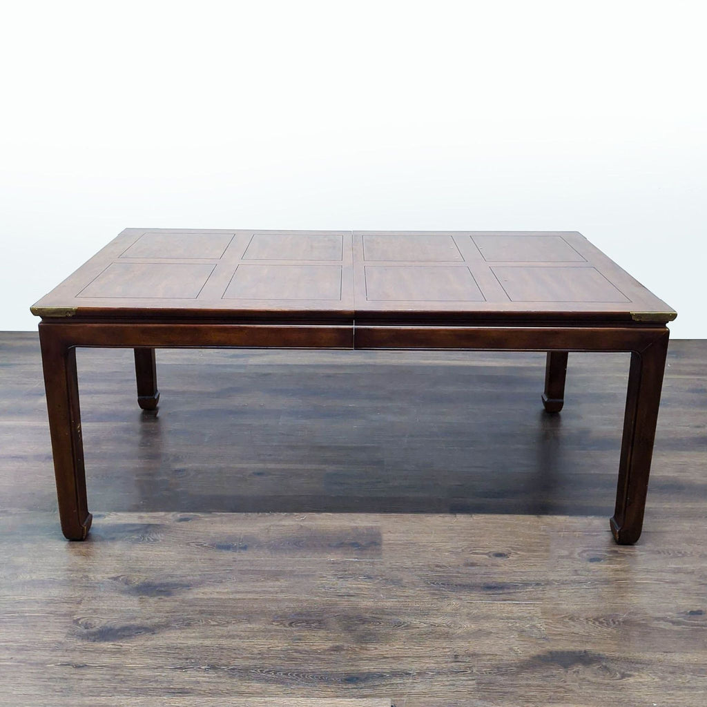 Expandable dining table with removable leaves to increase surface area to 100 inches.