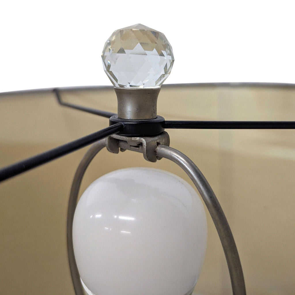 Modern crystal table lamps from Pottery Barn with sturdy square platforms and minimalist white shades.