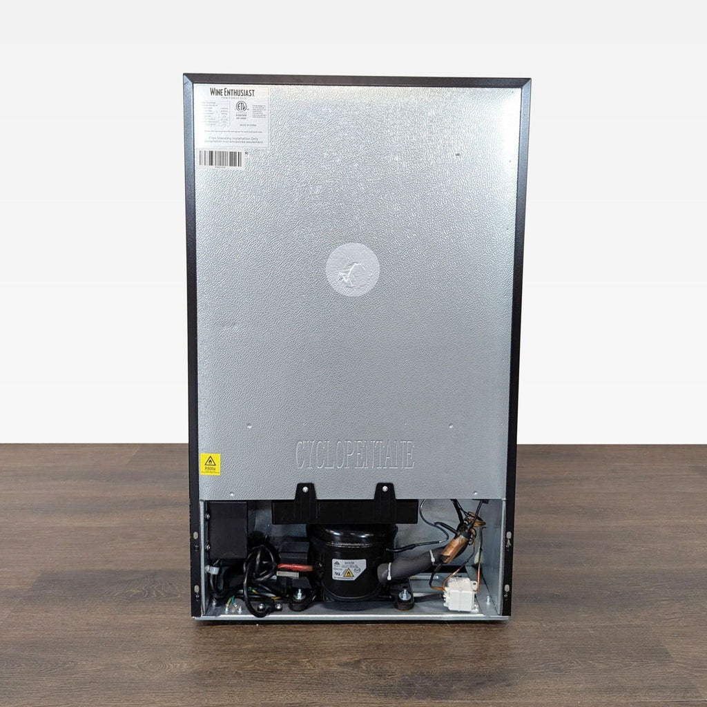 Modern black Wine Enthusiast wine fridge with glass door, digital controls, perfect for storing and chilling bottles.