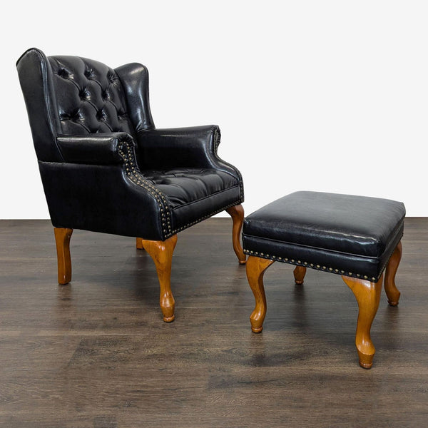 Black leather wingback lounge chair with tufted back and matching ottoman, set on wooden legs by Coaster.