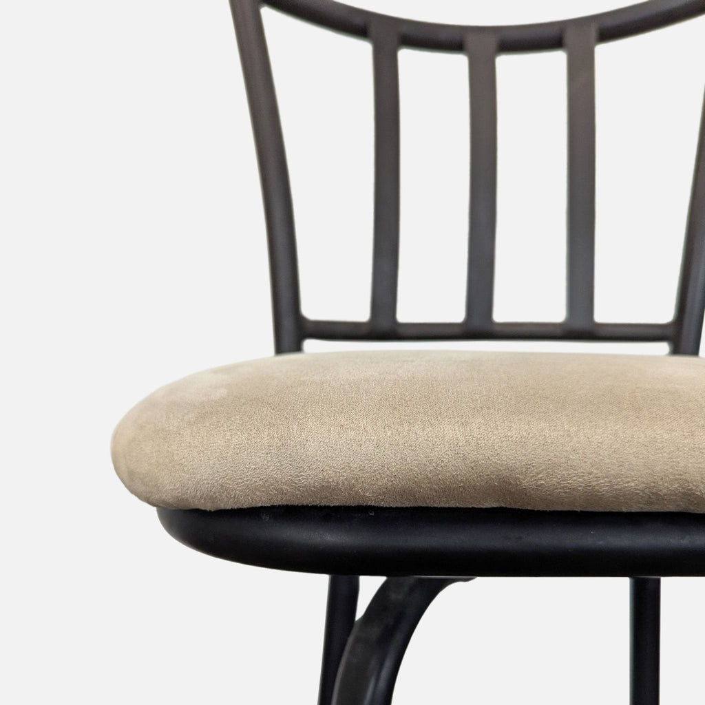 Bar stool chair featuring a beige padded seat, sturdy black frame, supportive back, and a convenient footrest.