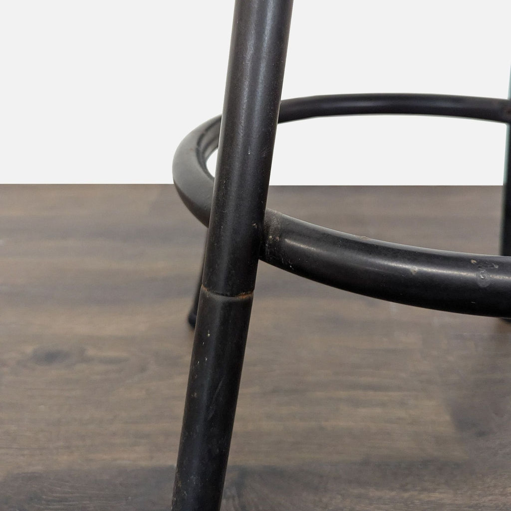Metal Bar Stool with Cushioned Beige Seat and Black Frame