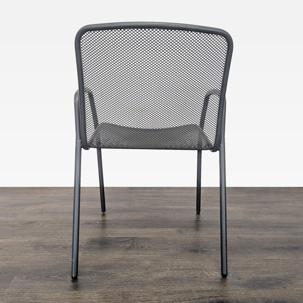 Room & Board set of 4 sturdy metal chairs with airy mesh seats and armrests, perfect for patios or dining.