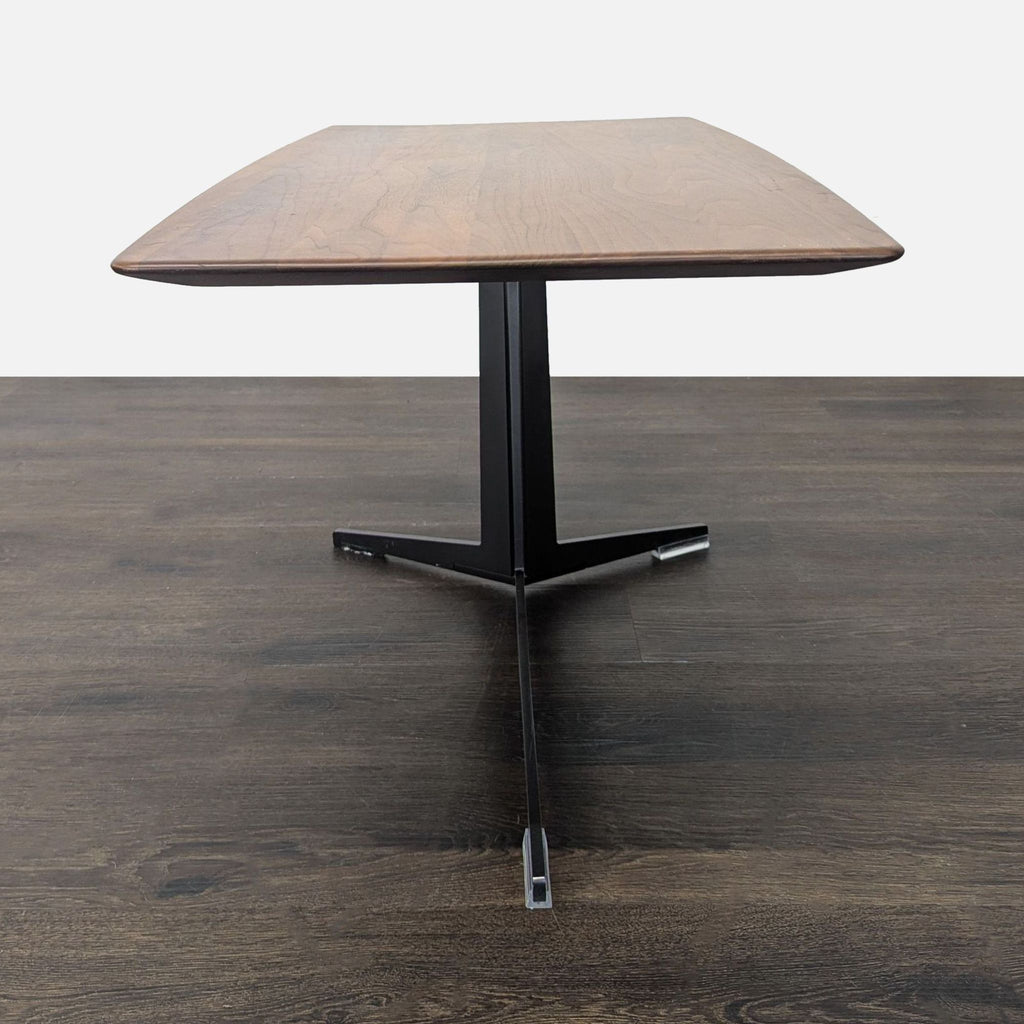 Modern side table featuring a walnut knife-edge top and sleek stainless steel base, designed by Antonio Citterio for Flexform.  