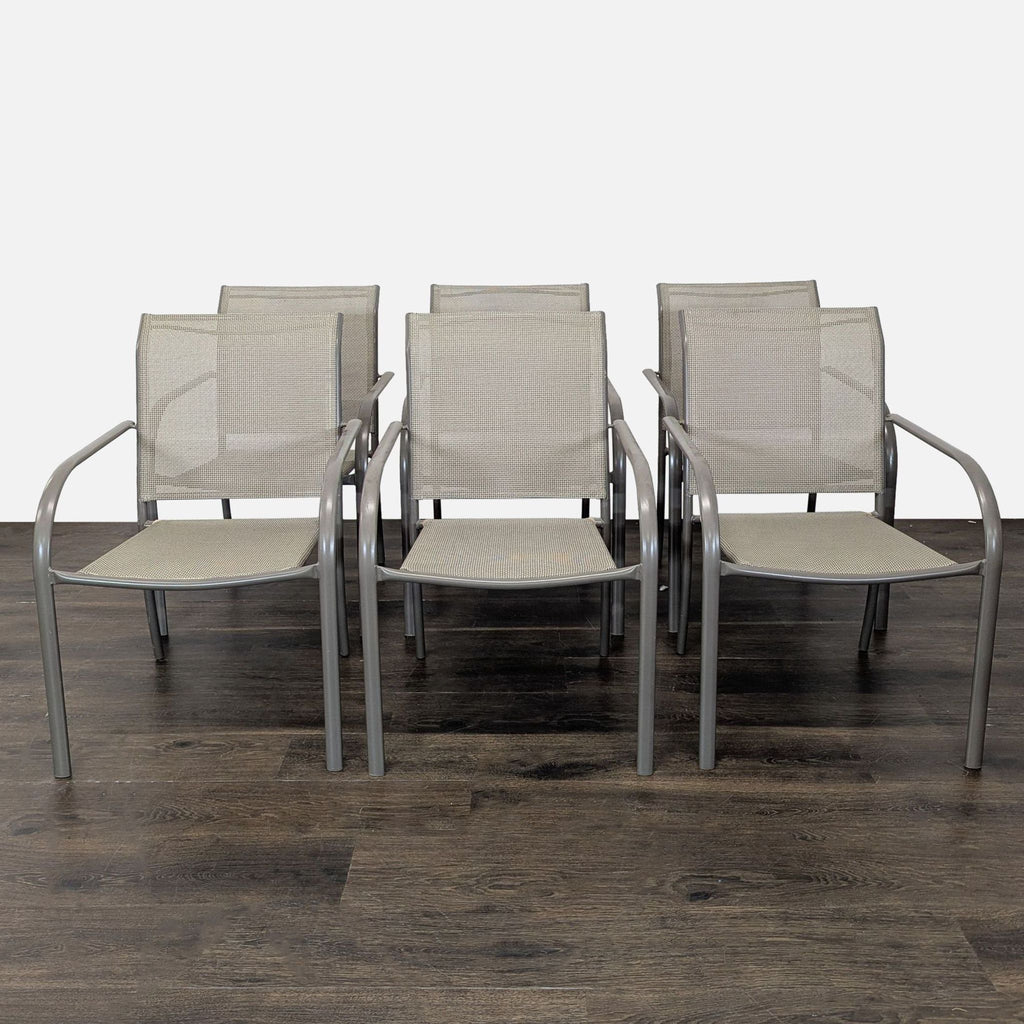 Set of six metal frame chairs with mesh seats and armrests, suitable for indoor or outdoor use.