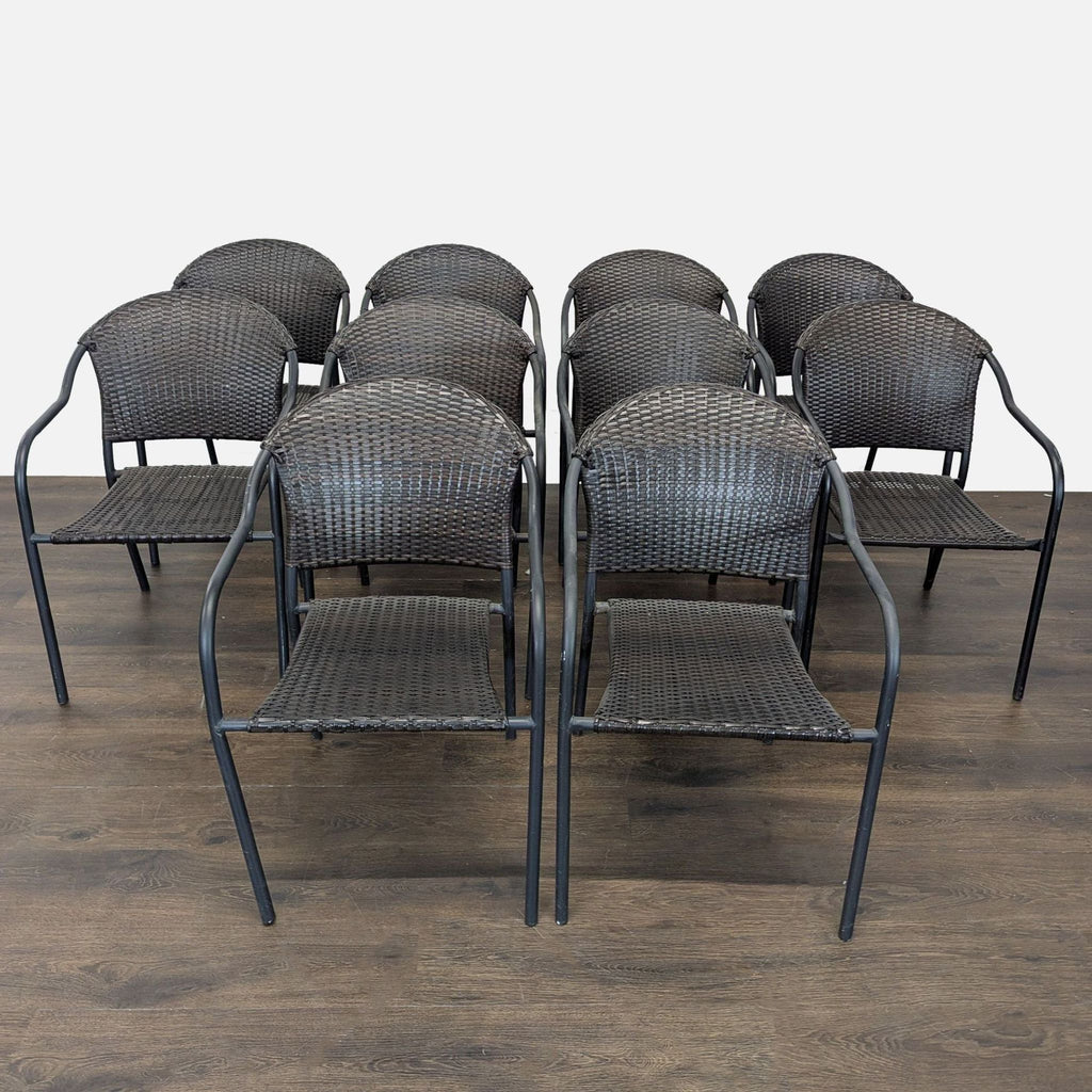 Set of 8 Pelham Bay stackable chairs with black rattan seats, metal frames, and armrests for indoor or outdoor use.