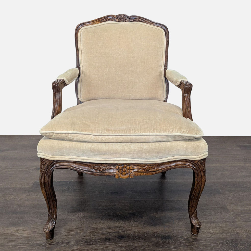 1. Vintage lounge chair with beige upholstery, plush cushion, and detailed dark wood frame, viewed from front.