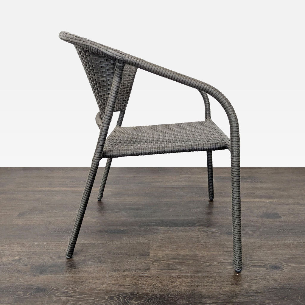 Side view of a woven patio chair, highlighting lightweight and stackable construction for indoor or outdoor use.