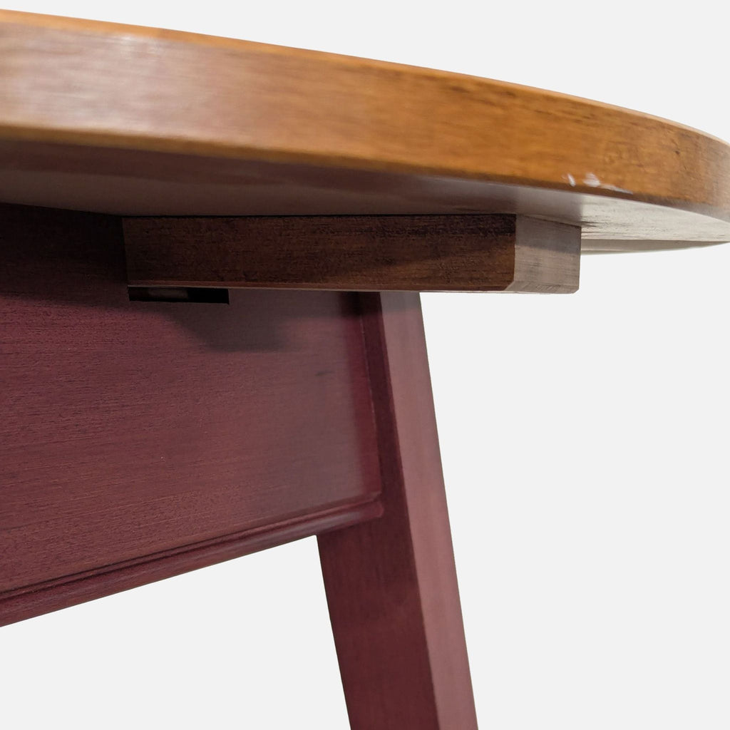 Stylish end table, two-tone with cranberry finish, crafted by Ethan Allen for living spaces.