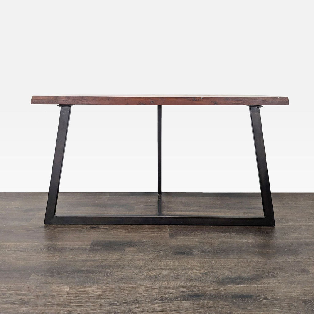 Modern side table by Moe’s with wooden top and dark steel base.  