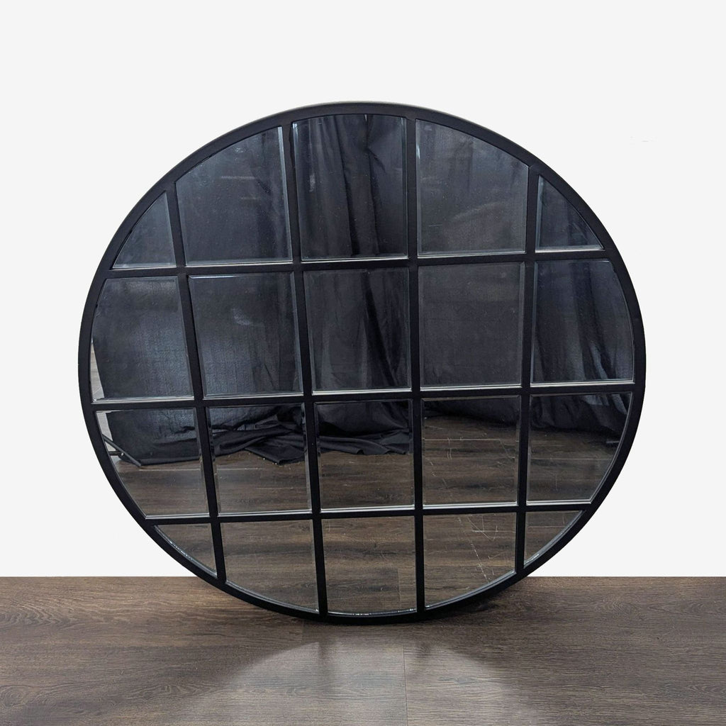 1. Beveled glass mirror with powder-coated metal frame by Walker Edison.  