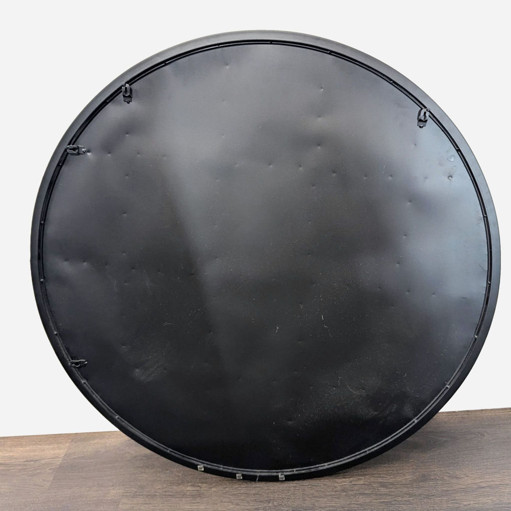 2. Walker Edison mirror featuring beveled glass panes and a powder-coated metal design.  