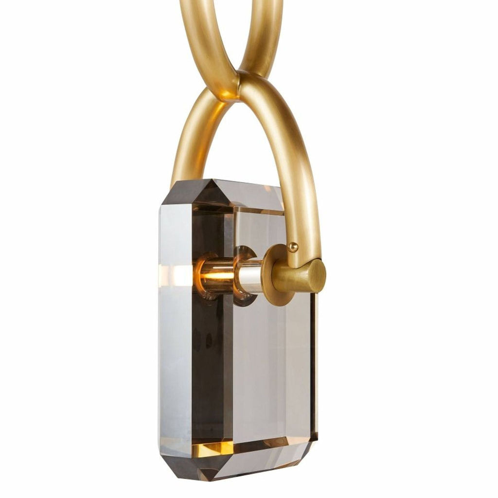 Modern gold chain pendant by Arteriors Home, highlighted by a sparkling clear crystal centerpiece.