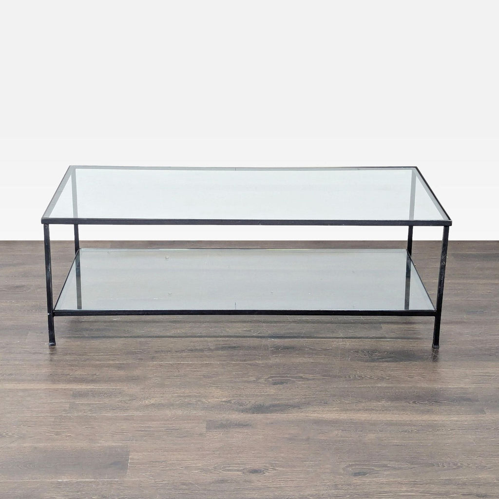 1. Rectangular glass coffee table with black metal frame and lower shelf, placed on wooden floor.  
