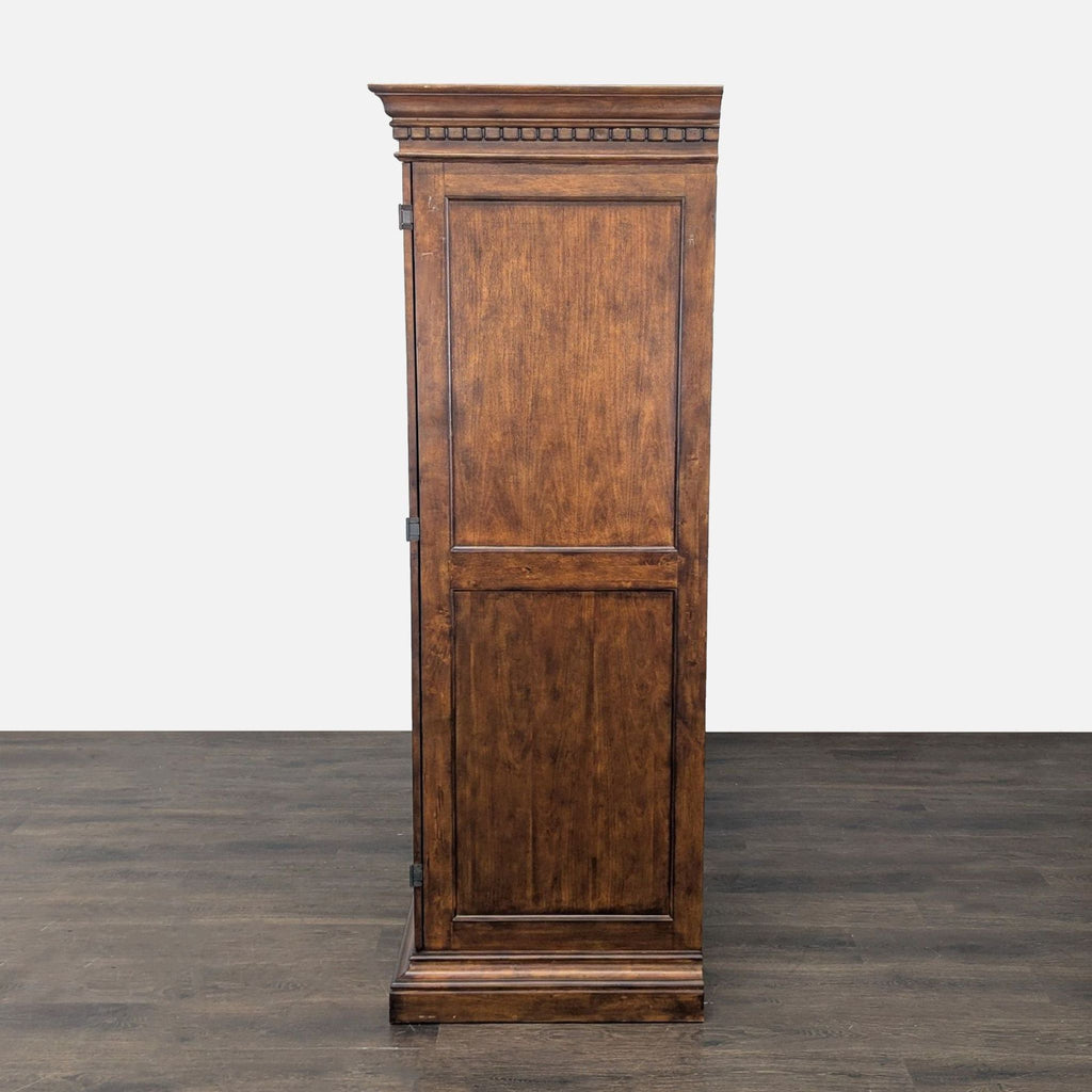 Cabinet by Howard Miller featuring wine bottle storage, glassware display, and a mix of glass and wood shelves.  