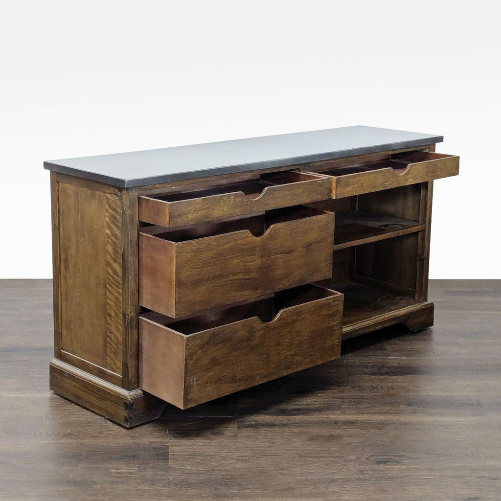 World Market console featuring four drawers, open shelf, and a sleek metal surface.