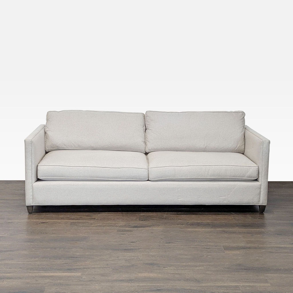 Crate & Barrel 3-seat sofa in light cream fabric with straight arms and deep cushions, modern and comfortable.  