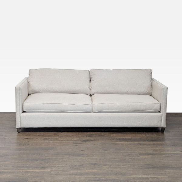 Crate & Barrel 3-seat sofa in light cream fabric with straight arms and deep cushions, modern and comfortable.  