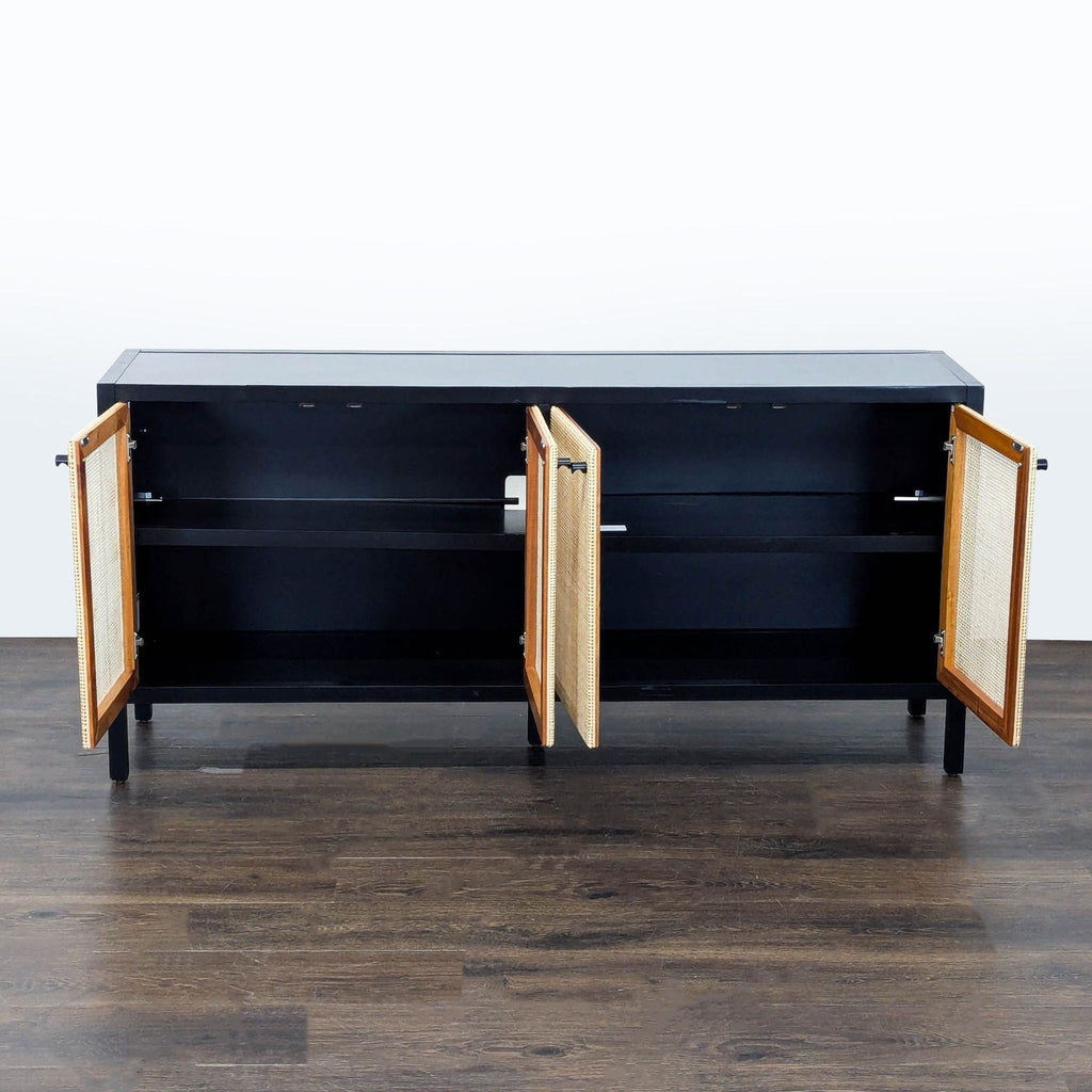 1. Modern wooden entertainment center with shelves, cabinets, and a large space for a TV.