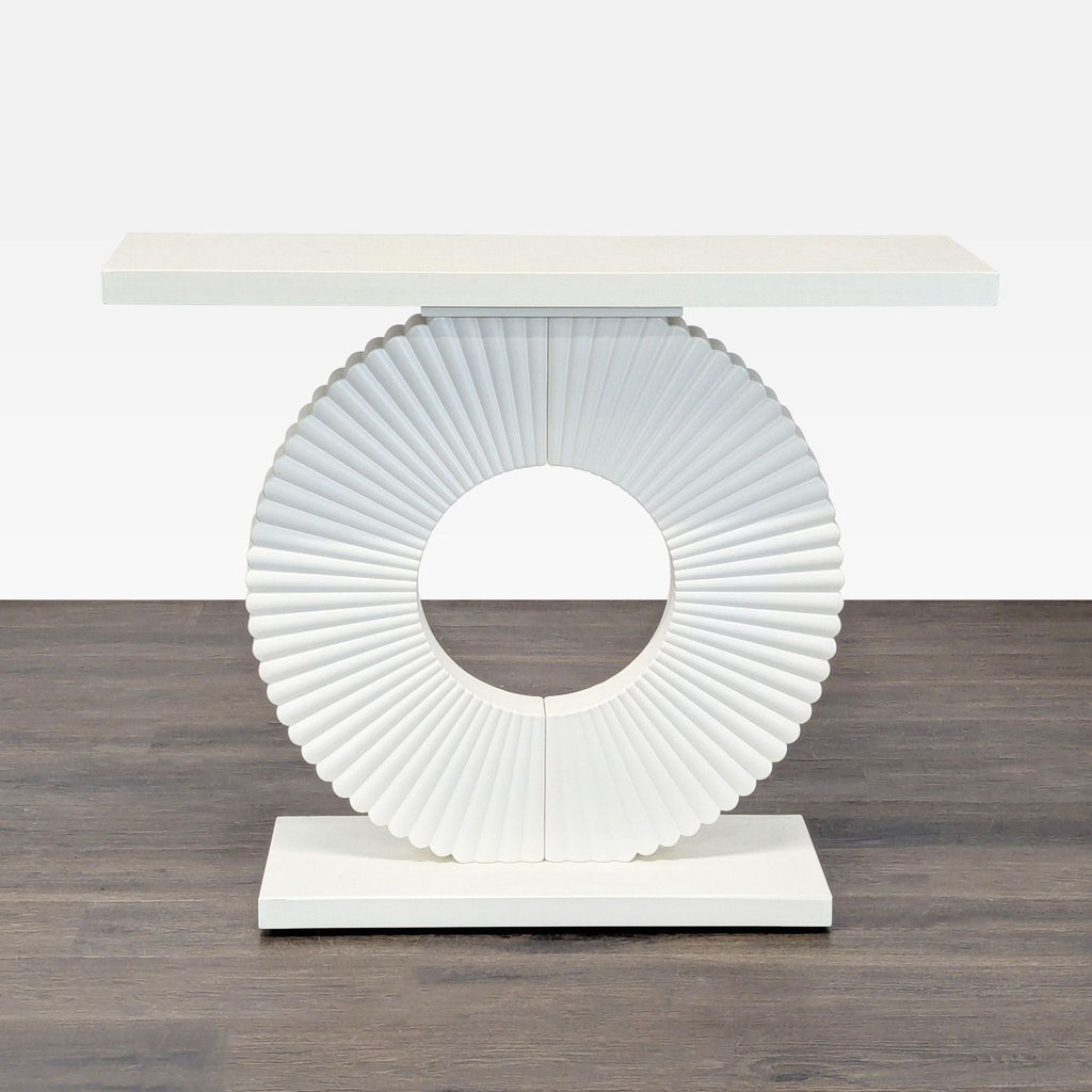Modern Tribesigns console table with a circular floral base and curved lines in engineered wood.  