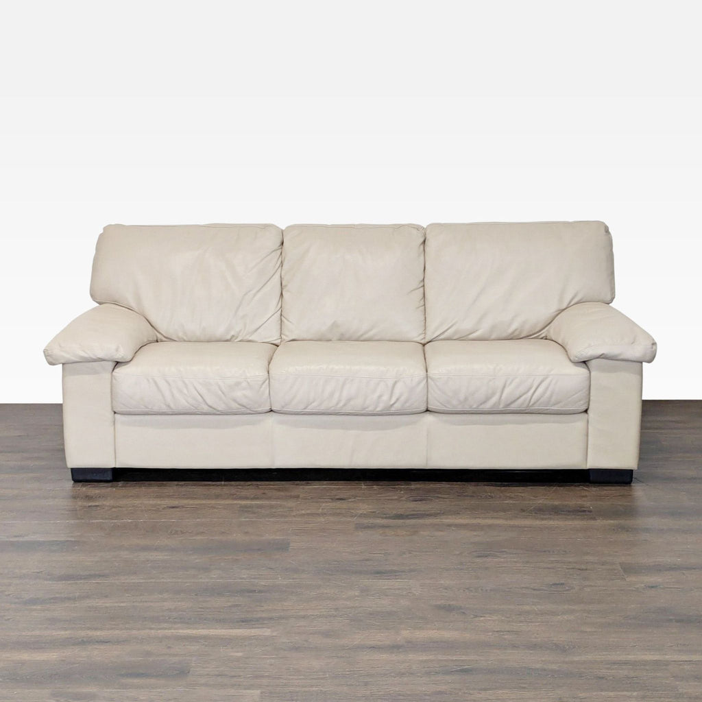 Italsofa 3-seat sofa in beige leather with plush cushions and wide armrests, ideal for living rooms.