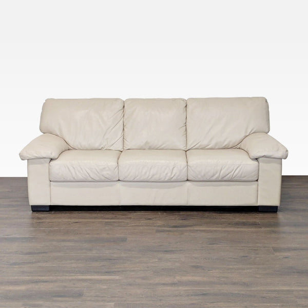 Italsofa 3-seat sofa in beige leather with plush cushions and wide armrests, ideal for living rooms.