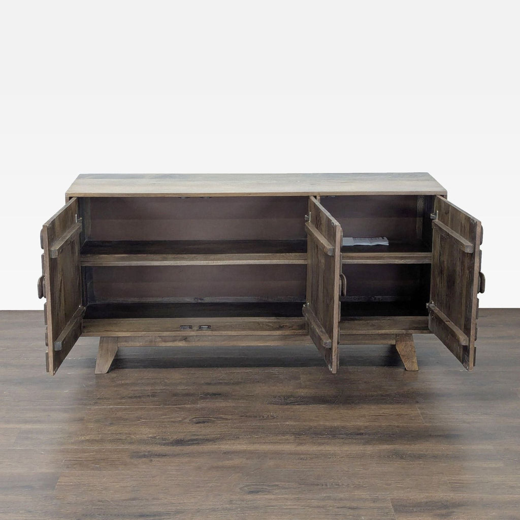 Darby Sideboard: Walnut finish, three concealed doors, Euro-style hinges, and storage shelves; Steve Silver brand.