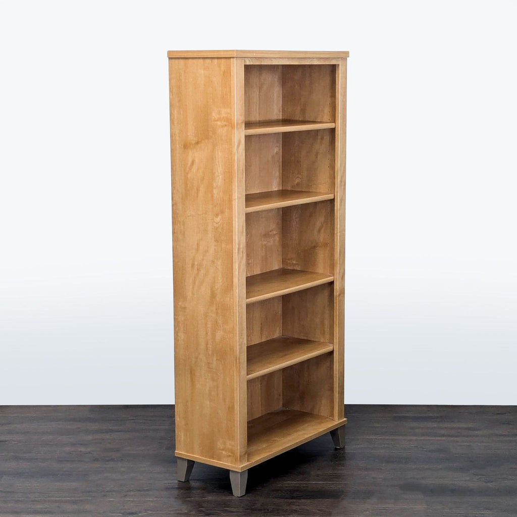 2. Modern Bush Furniture bookcase featuring multiple open shelves for storage and display.  