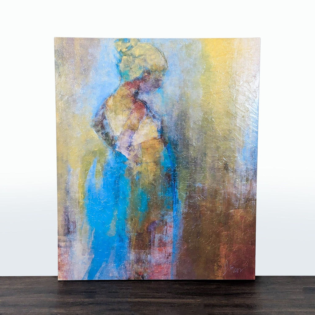 Abstract Z Gallerie print showing a woman's silhouette in blue, gold, and brown tones with textured details.