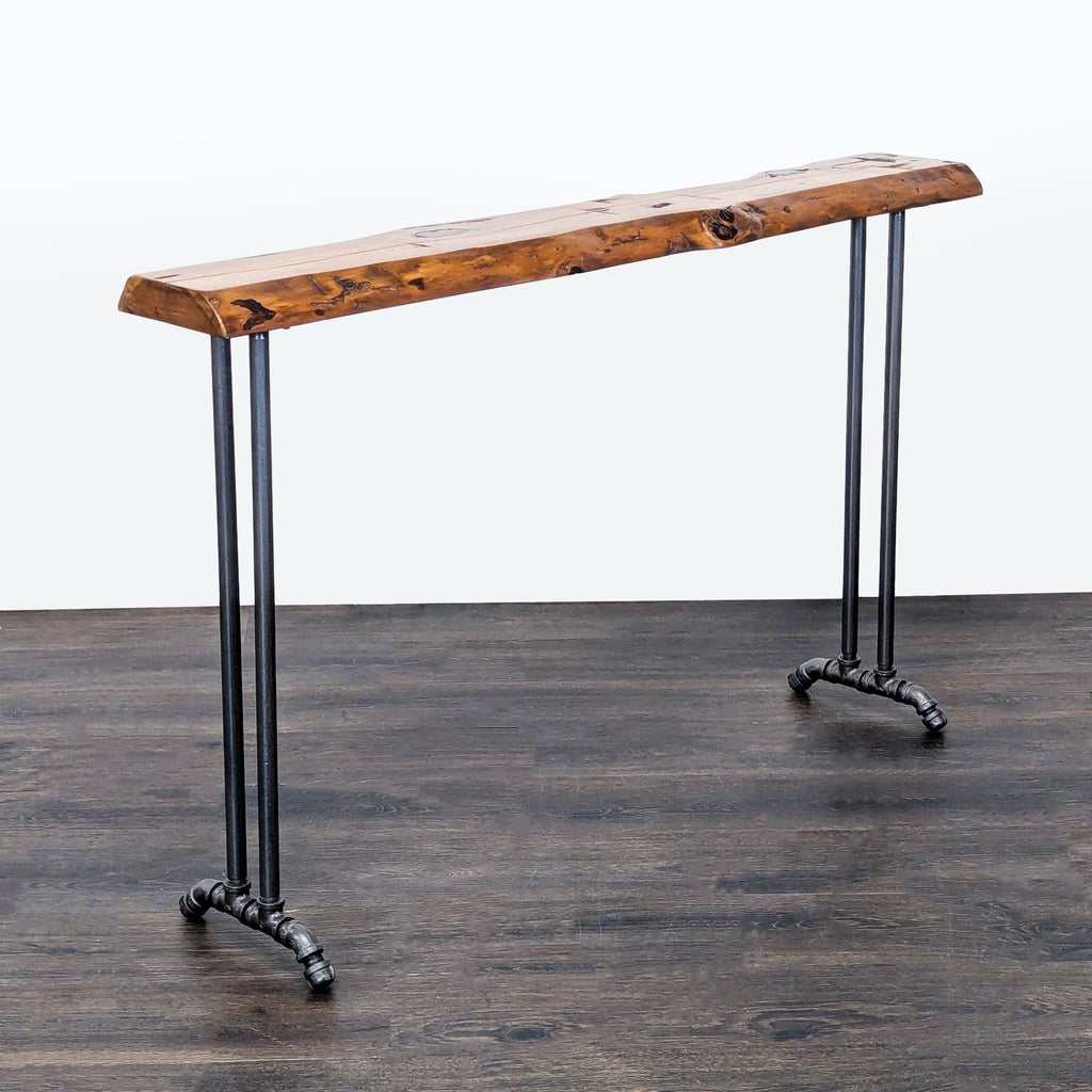 2. Angled view of a rustic side table featuring a thick natural wood slab and industrial black pipe legs.