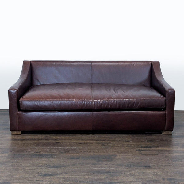 Brown leather 3-seat sofa by Sugarhill Custom Upholstery with modern design, sloped arms, and wooden feet.