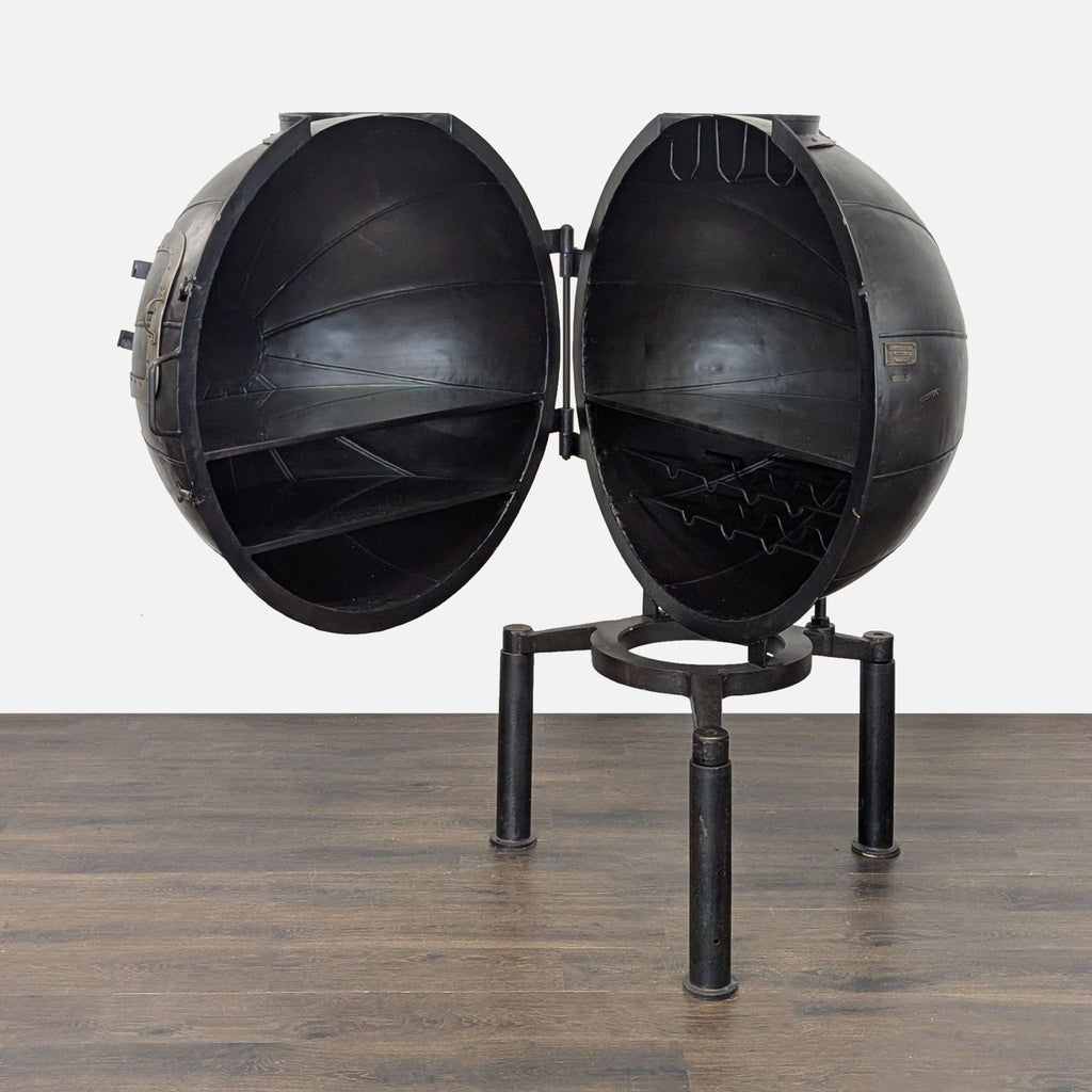 Repurposed 1920s German iron bulb-testing machine used as a vintage-style bar cart with wine and glass storage.