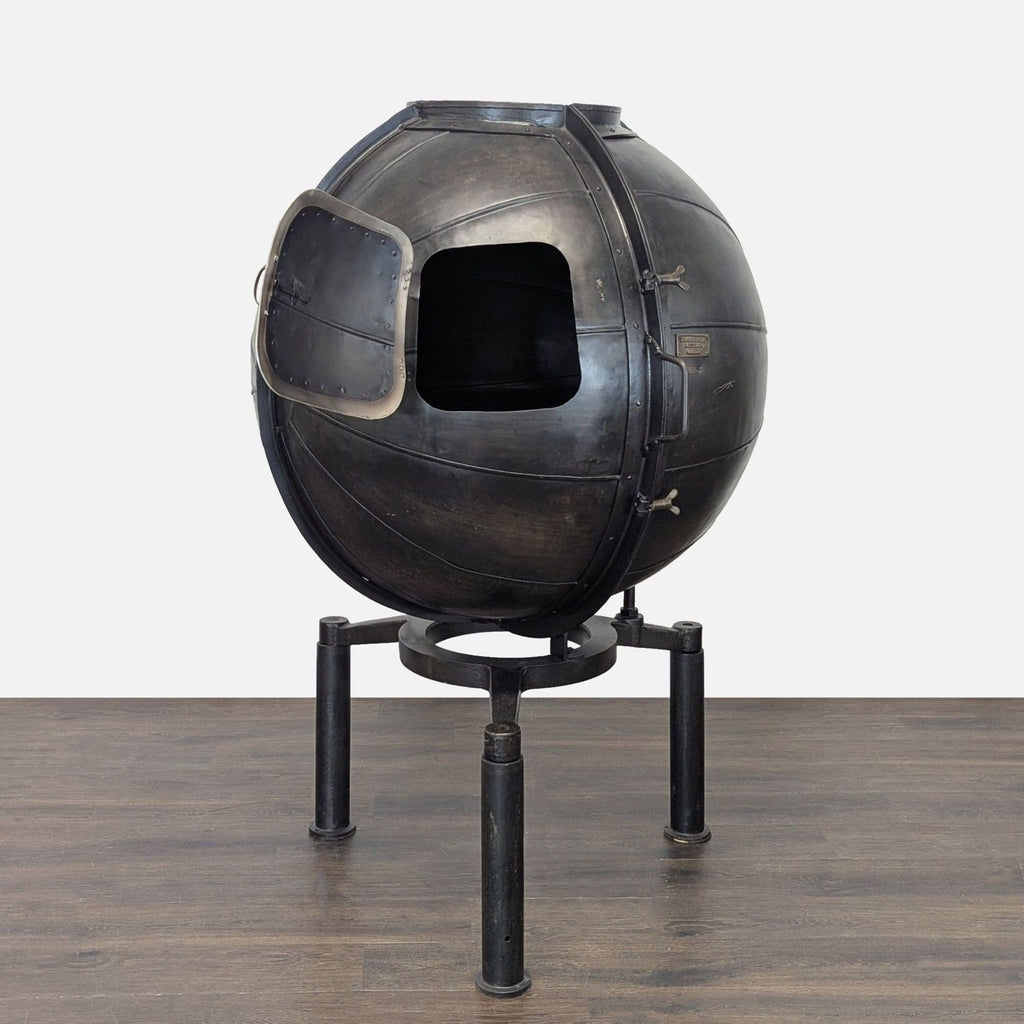Antiqued iron machine-turned-bar cart with hinged and hatch openings, for storing spirits, stemware, and wine bottles.
