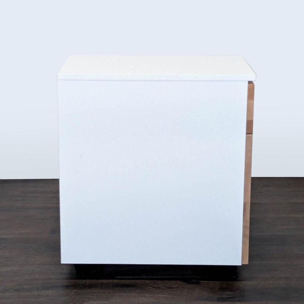 Movable cabinet with dual secure drawers, natural wood front, white panels, and lock, ideal for offices.