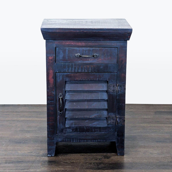 End table with Louvre-style door and interior shelf, shown in a modern setting.