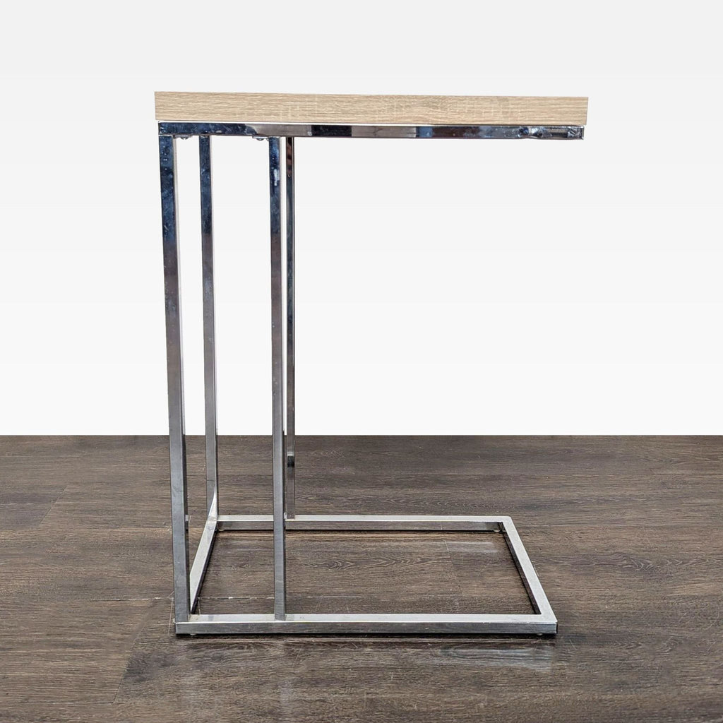 Minimalist engineered wood and metal end table by Monarch.