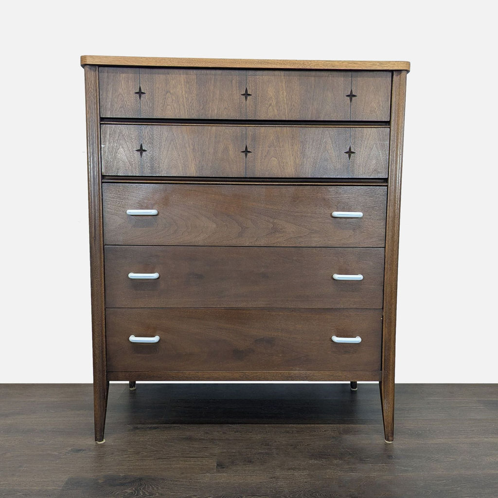 Mid-century modern Broyhill dresser with five drawers, clean lines, and metal handles for bedroom storage.