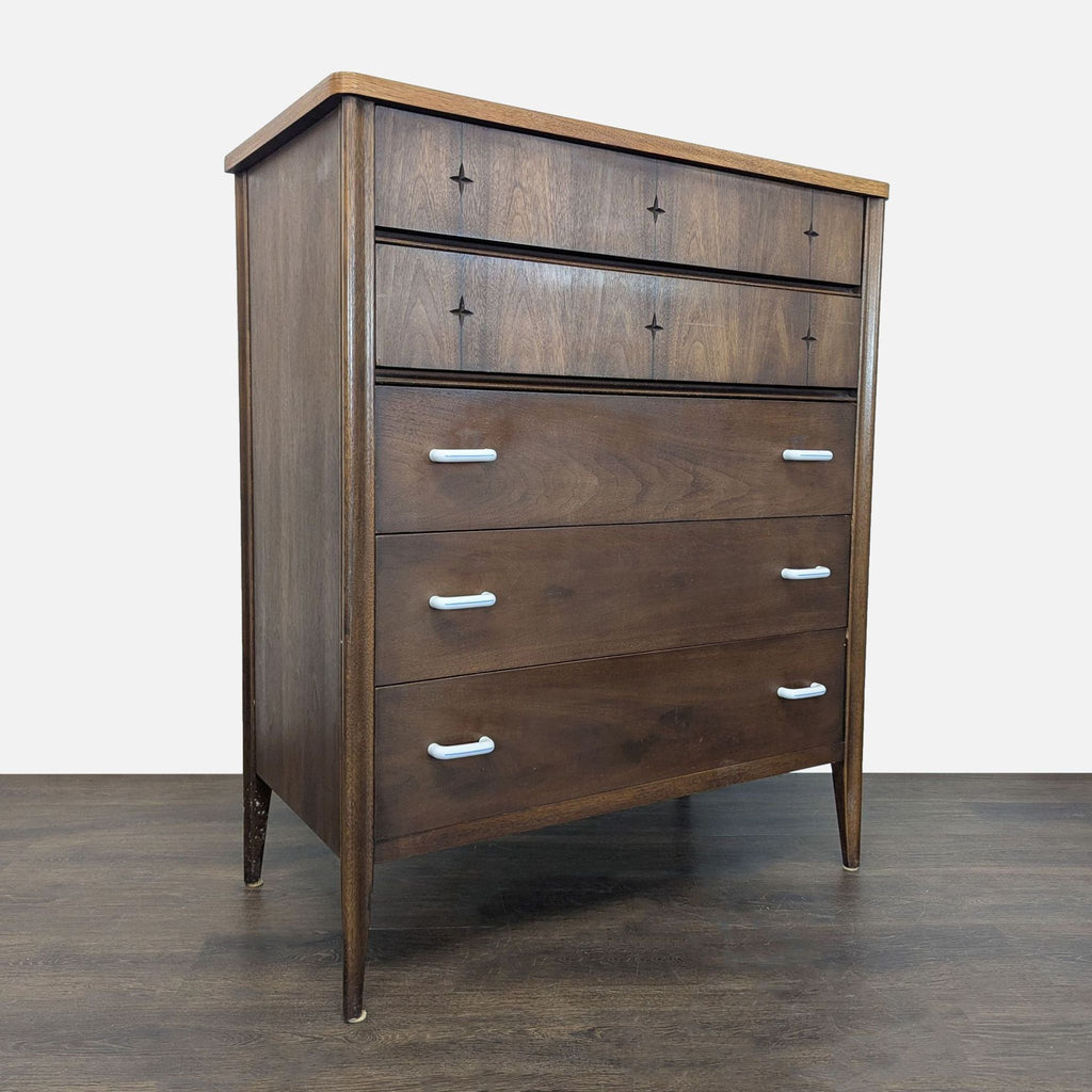 Classic Broyhill dresser in wood with minimalist style, sturdy build, and five roomy drawers for essentials.