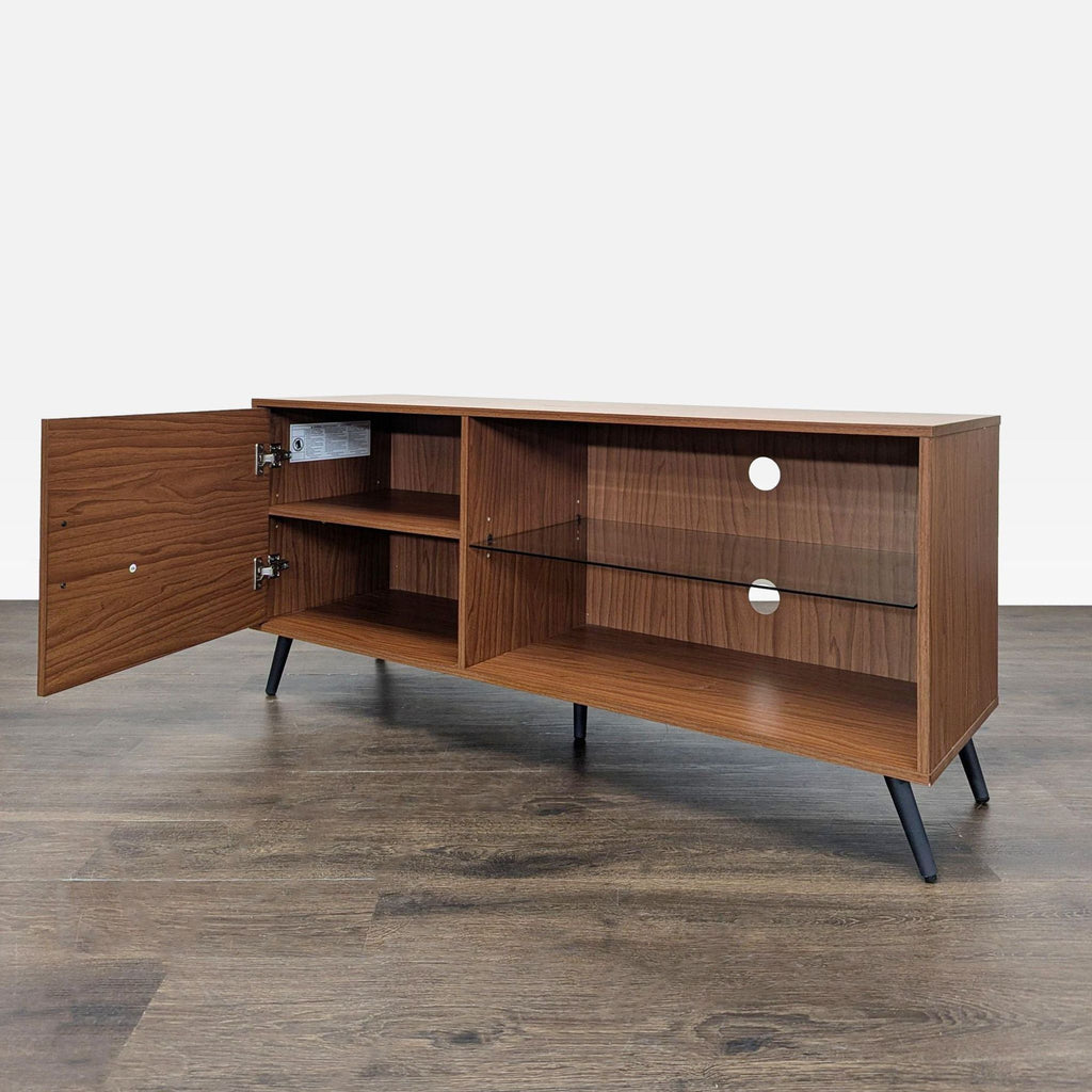 Modern entertainment center with tempered glass, MDF shelves, and sturdy metal legs.  