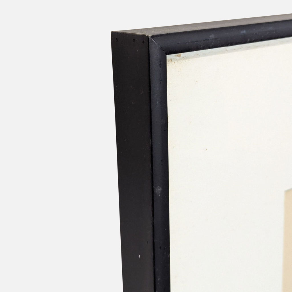2. Close-up view of the black frame corner, showing the clean edges and minimalistic design of the print.