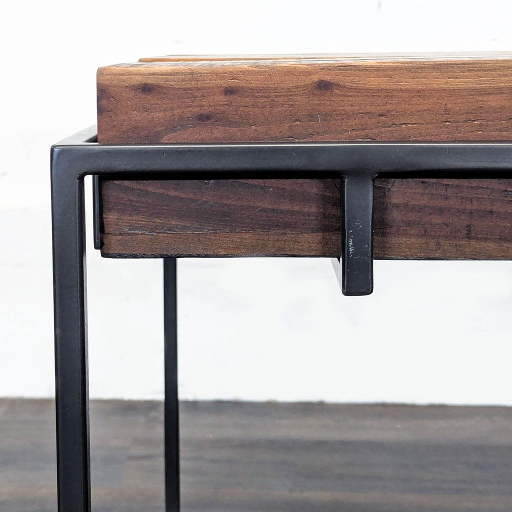 3. Eco-friendly West Elm table crafted from reclaimed wood with visible grain details.