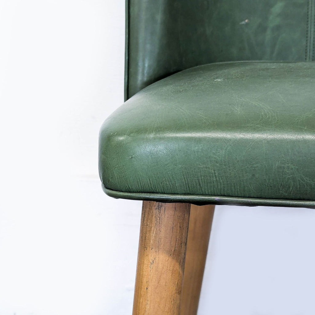 Set of Three Leather Dining Chairs on Wood Legs