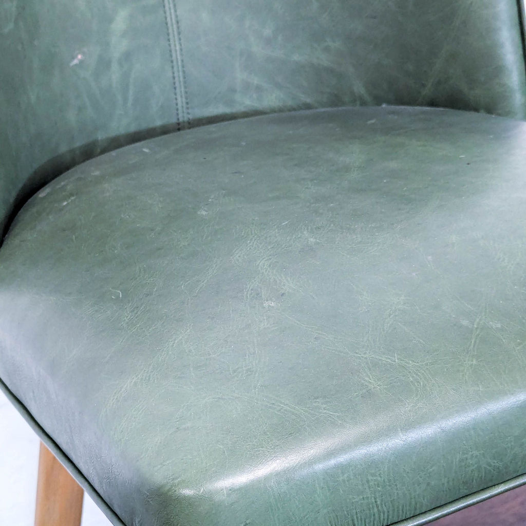 Set of Three Leather Dining Chairs on Wood Legs