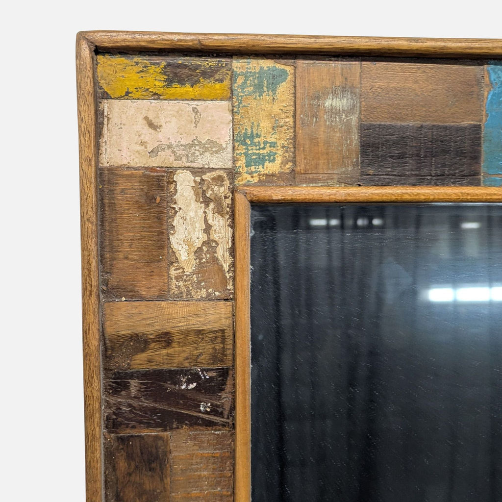 1. Rustic mirror close-up showing a weathered wooden frame with multicolored distressed paint patches.