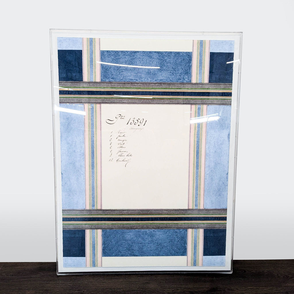 Large abstract art with navy, blush, green, and gray plaid layers and French script, floating in an acrylic frame.  