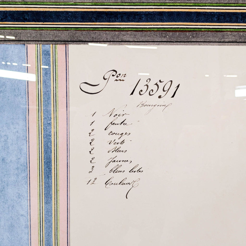 Contemporary artwork of overlapping stripes and handwritten script in soft colors, displayed in a shadowbox frame.  